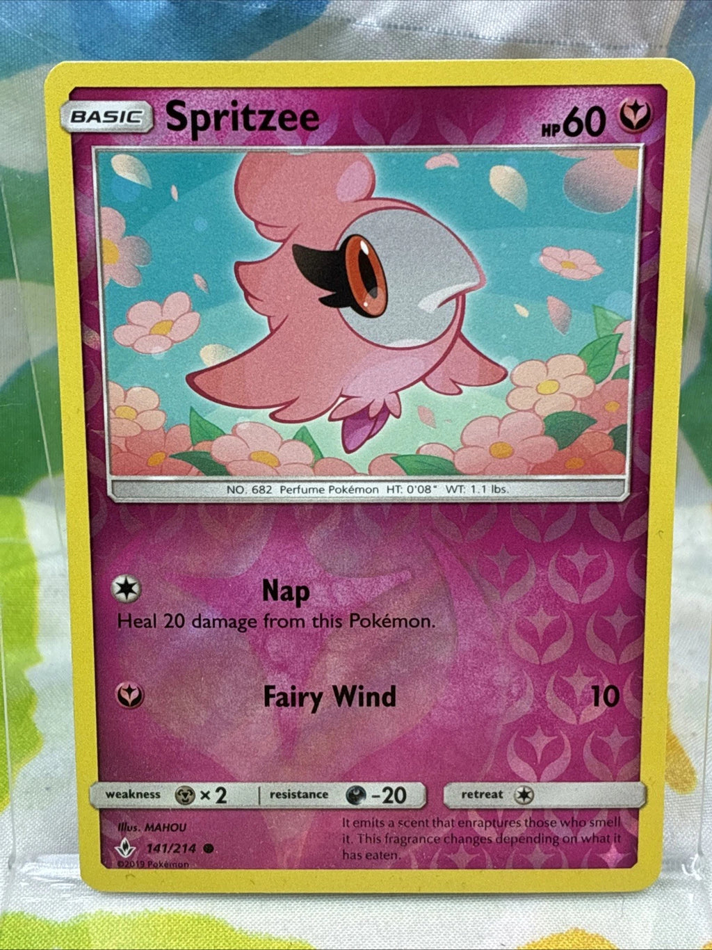 Pokémon Spritzee Reverse Holo 141/214 Unbroken Bonds Card