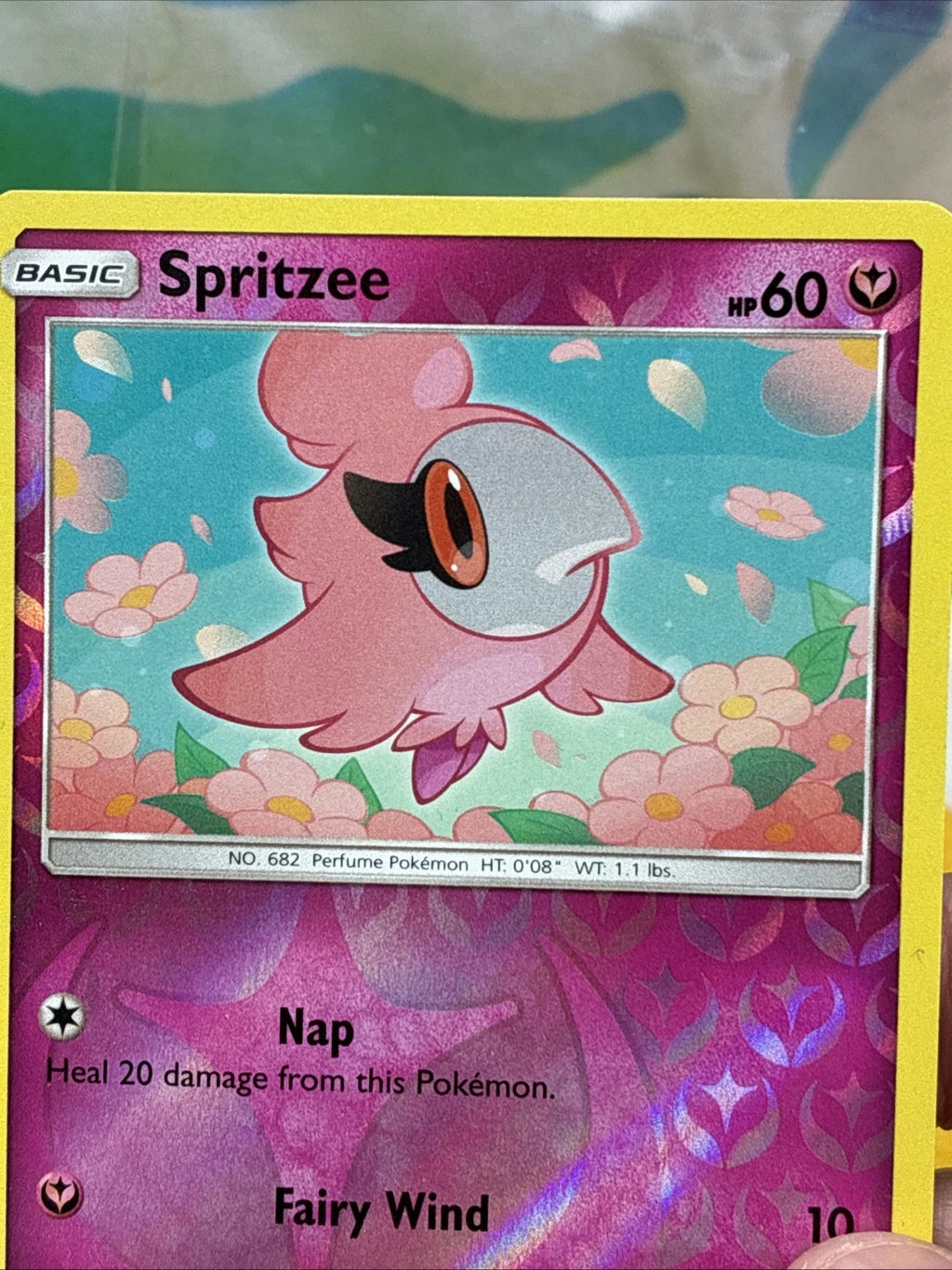 Pokémon Spritzee Reverse Holo 141/214 Unbroken Bonds Card